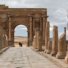 View of Arch de Trajan. The ruins of the Roman city of Timgad dating from the 2nd century. Algeria. Africa. 25th November 2023., License Type: media_digital, Download Time: 2024-07-25T12:53:42.000Z, User: bhealy950, Editorial: true, purchase_order: 65050, job: Lonely Planet Online Editorial, client: Best places to see in Algeria, other: Brian Healy